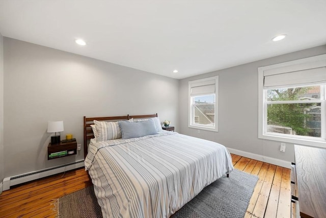 7 Trenton St Unit 2, Boston, MA 02129 - bedroom featuring a baseboard heating unit, hardwood / wood-style flooring, baseboards, and recessed lighting