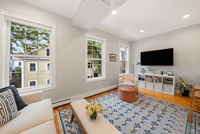 7 Trenton St Unit 2, Boston, MA 02129 - living room featuring wood finished floors, a baseboard radiator, ornamental molding, recessed lighting, and baseboards
