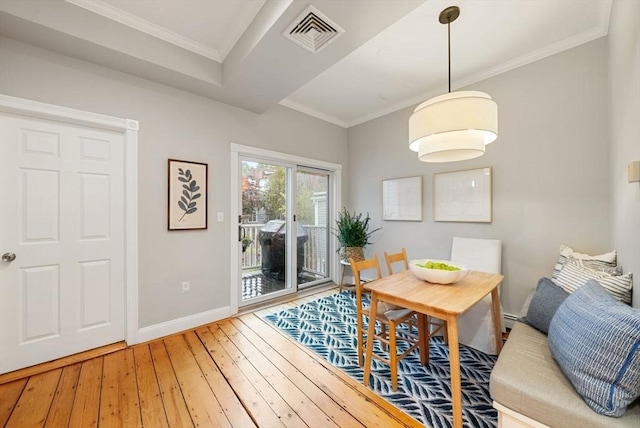 7 Trenton St Unit 2, Boston, MA 02129 - dining space with baseboards, wood-type flooring, and crown molding