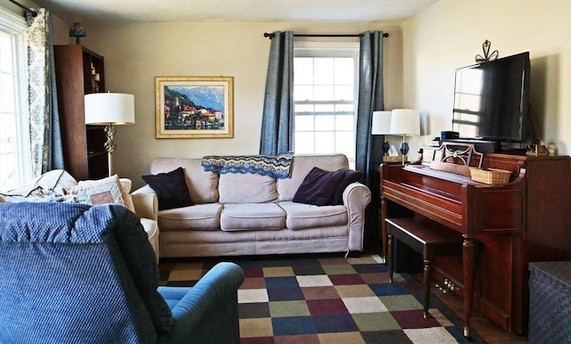living area featuring tile patterned floors