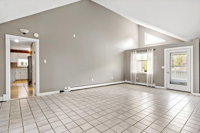 unfurnished living room featuring baseboards, a baseboard heating unit, light tile patterned flooring, and high vaulted ceiling