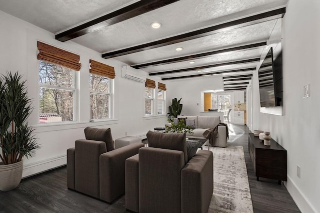 living room with baseboards, beamed ceiling, dark wood-style flooring, baseboard heating, and a wall mounted AC