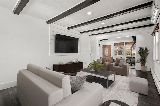 living room with recessed lighting, beam ceiling, baseboards, and wood finished floors