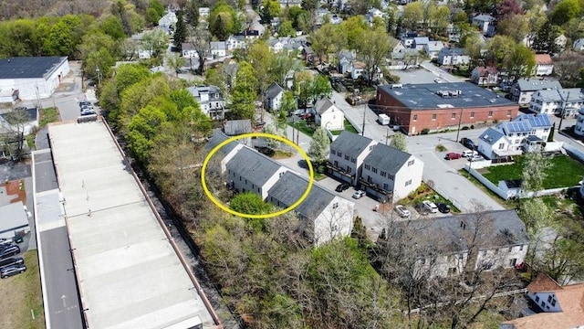 birds eye view of property with a residential view