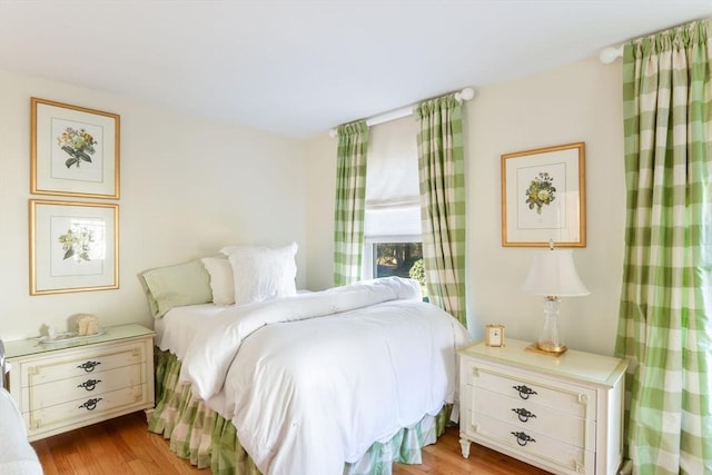 bedroom featuring light hardwood / wood-style floors