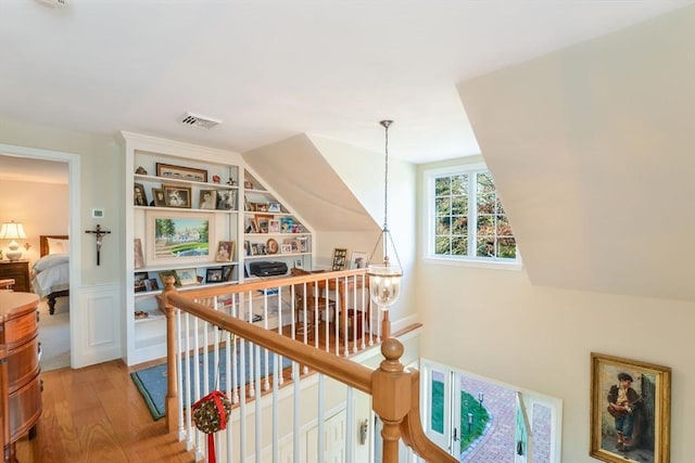 hallway featuring hardwood / wood-style floors