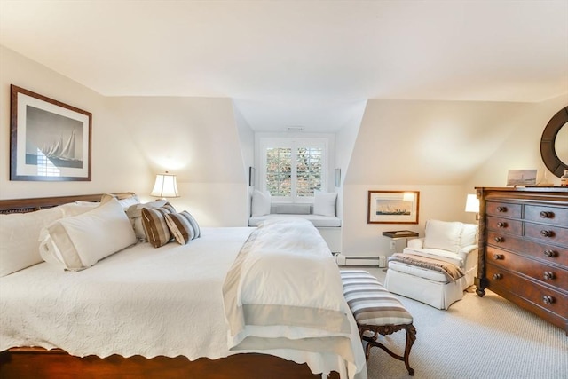 bedroom with carpet flooring, lofted ceiling, and baseboard heating