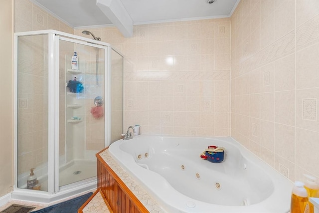 22 Washington St, Methuen, MA 01844 - bathroom featuring a shower stall, a jetted tub, tile walls, and crown molding