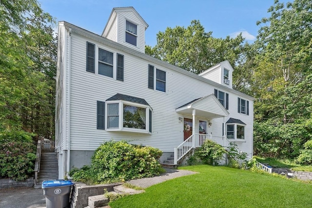 22 Washington St, Methuen, MA 01844 - view of front of property with a front yard and stairs