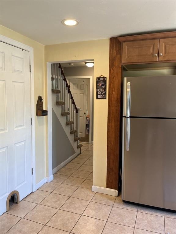 13 Harrison Ave, Bourne, MA 02532 - kitchen with freestanding refrigerator, light tile patterned flooring, and recessed lighting