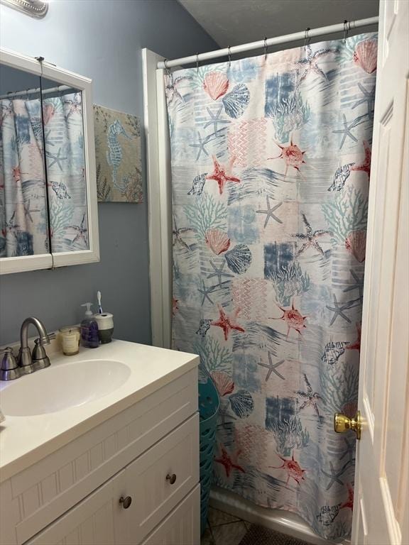 13 Harrison Ave, Bourne, MA 02532 - full bathroom featuring vanity and a shower with shower curtain