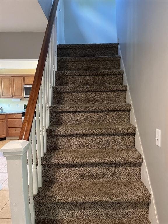 13 Harrison Ave, Bourne, MA 02532 - staircase with tile patterned floors