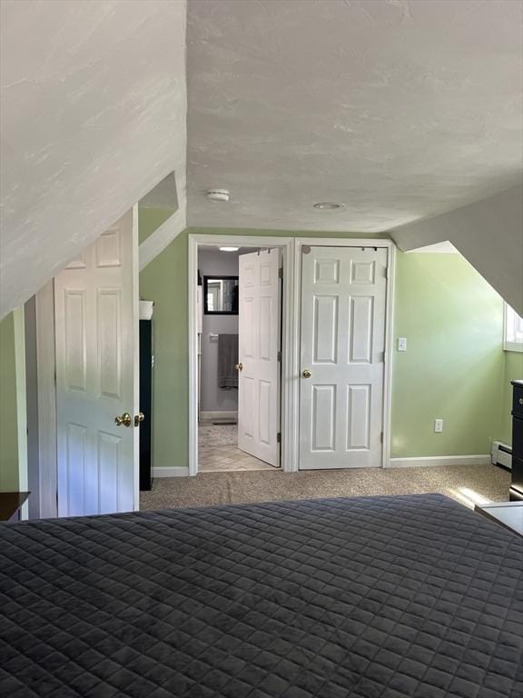 13 Harrison Ave, Bourne, MA 02532 - bonus room with carpet, lofted ceiling, and baseboard heating