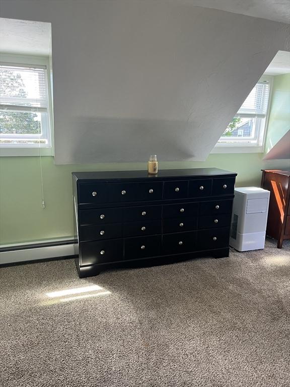 13 Harrison Ave, Bourne, MA 02532 - unfurnished bedroom featuring carpet floors and a baseboard heating unit