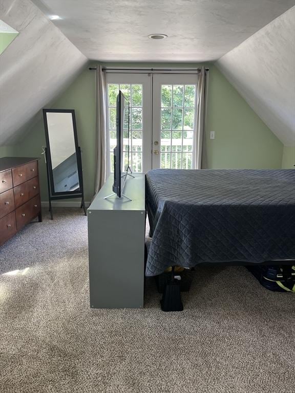 13 Harrison Ave, Bourne, MA 02532 - bedroom featuring vaulted ceiling, access to outside, and carpet flooring