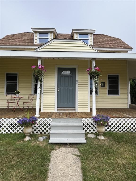 13 Harrison Ave, Bourne, MA 02532 - view of front facade with covered porch and roof with shingles