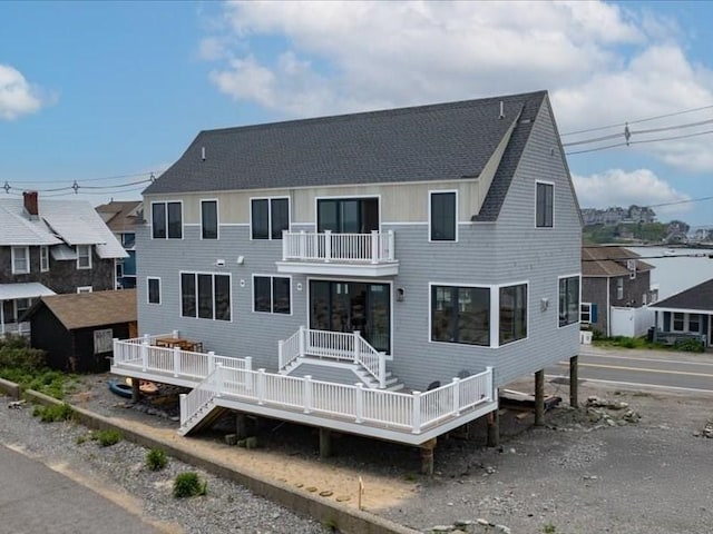 1092 Nantasket Ave, Hull, MA 02045 - rear view of house featuring a balcony and roof with shingles