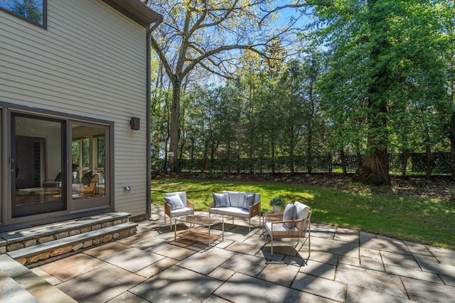 view of patio with fence and an outdoor hangout area