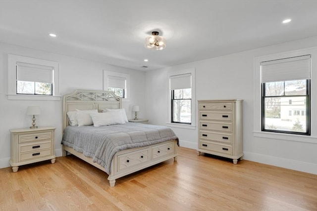 bedroom featuring recessed lighting, baseboards, and light wood finished floors