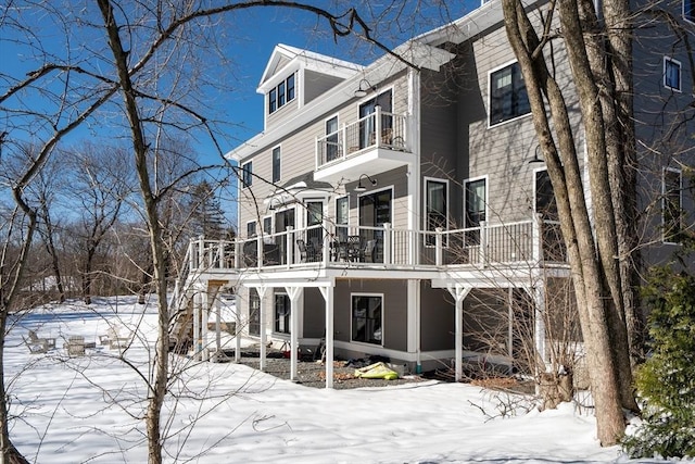 view of snow covered house