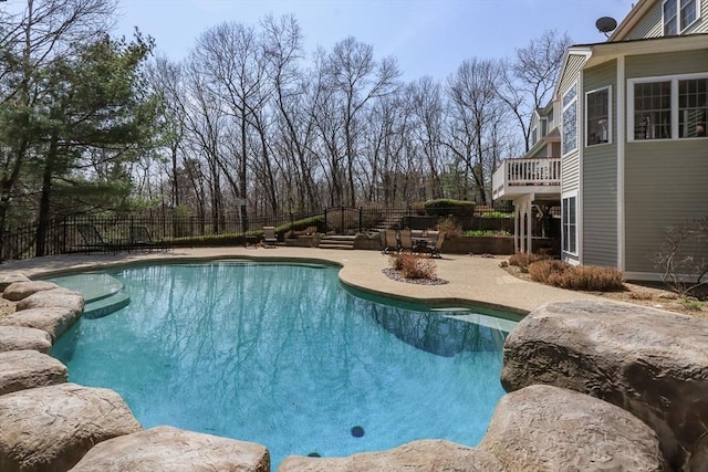 view of pool featuring a fenced in pool, a fenced backyard, and a patio