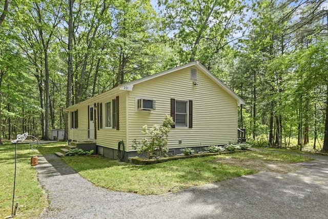 231 Georgetown Rd, Boxford, MA 01921 - view of home's exterior featuring a lawn