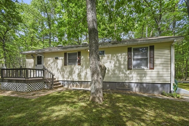 231 Georgetown Rd, Boxford, MA 01921 - back of house featuring a yard and a wooden deck