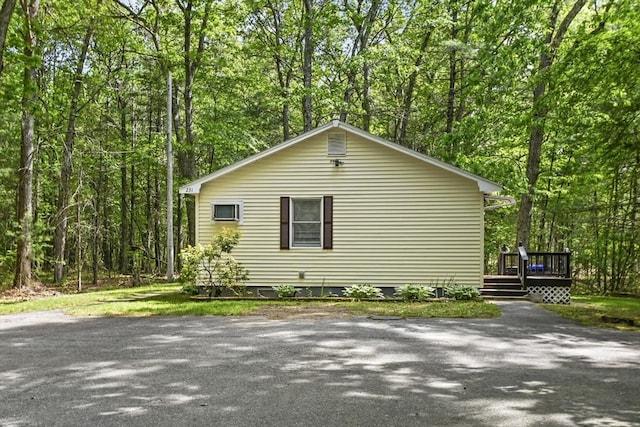 231 Georgetown Rd, Boxford, MA 01921 - view of side of home with a wooden deck and a view of trees
