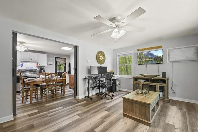 231 Georgetown Rd, Boxford, MA 01921 - office space with a ceiling fan, light wood-style flooring, and baseboards