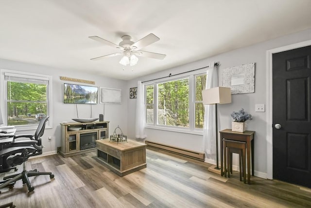 231 Georgetown Rd, Boxford, MA 01921 - office featuring baseboard heating, a ceiling fan, wood finished floors, and baseboards