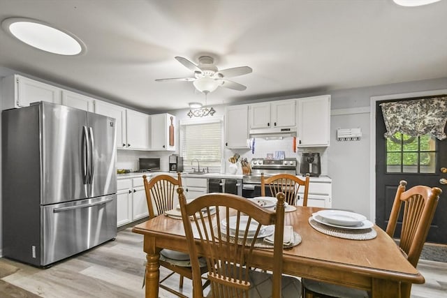 231 Georgetown Rd, Boxford, MA 01921 - dining room with ceiling fan and light wood-style flooring
