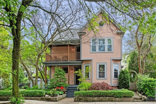 5 Willow Ave, Somerville, MA 02144 - view of front of home with a balcony and a porch