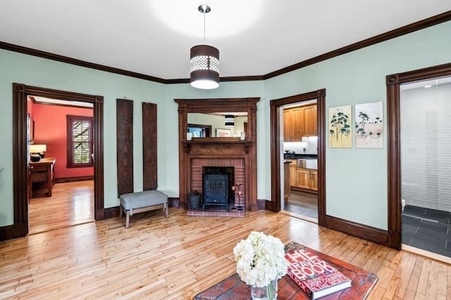 5 Willow Ave, Somerville, MA 02144 - living area with wood-type flooring, ornamental molding, and baseboards