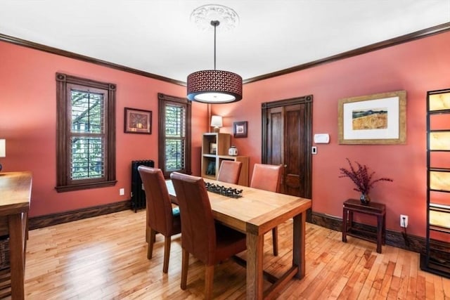 5 Willow Ave, Somerville, MA 02144 - dining space featuring ornamental molding, light wood-style floors, and baseboards