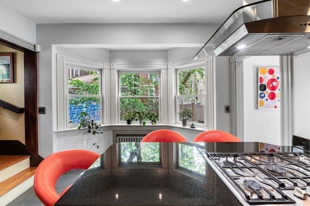 5 Willow Ave, Somerville, MA 02144 - kitchen featuring wall chimney range hood and stainless steel gas cooktop