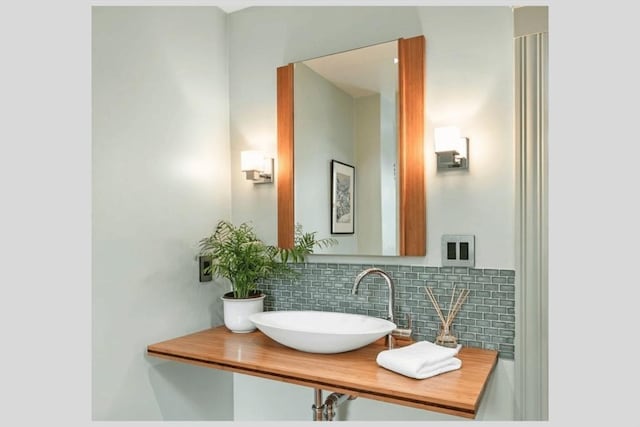 5 Willow Ave, Somerville, MA 02144 - bathroom featuring a sink and backsplash