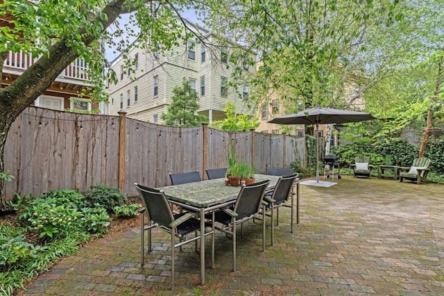 5 Willow Ave, Somerville, MA 02144 - view of patio with outdoor dining space and a fenced backyard