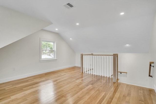 38 Green St Unit 38, Watertown, MA 02472 - bonus room with lofted ceiling, light wood finished floors, recessed lighting, and baseboards