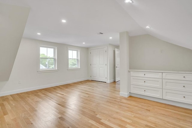 38 Green St Unit 38, Watertown, MA 02472 - additional living space with vaulted ceiling, light wood finished floors, recessed lighting, and baseboards