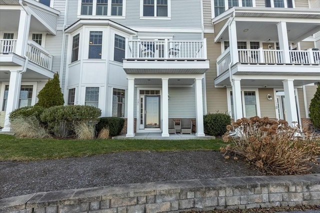 doorway to property with a balcony