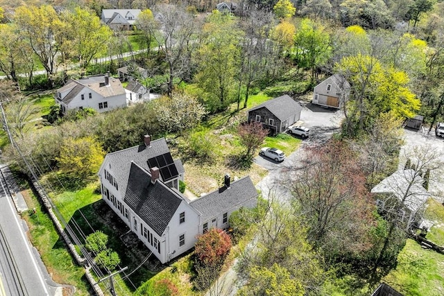 831 Main St, Dennis, MA 02638 - aerial view of property and surrounding area featuring a tree filled landscape