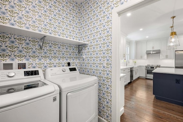 10 Fieldstone Way Unit 11, Wellesley, MA 02482 - washroom featuring wallpapered walls, washer and dryer, dark wood-type flooring, and recessed lighting