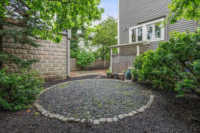 view of yard featuring fence