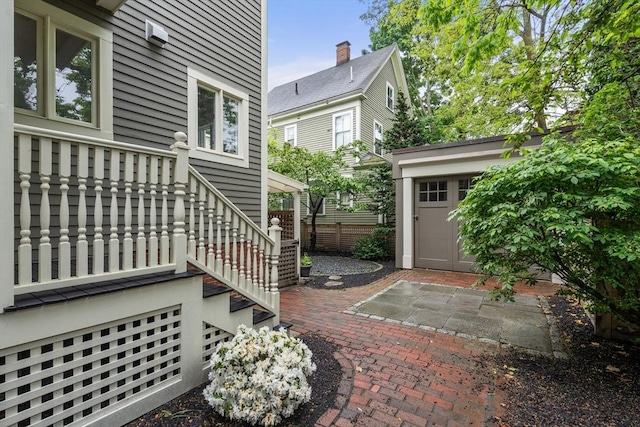 property entrance with a patio