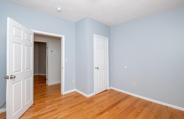 unfurnished bedroom featuring light hardwood / wood-style flooring