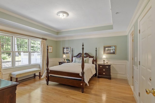22 Hummock Way Unit 22, Hudson, MA 01749 - bedroom with light wood finished floors, a decorative wall, wainscoting, ornamental molding, and a raised ceiling