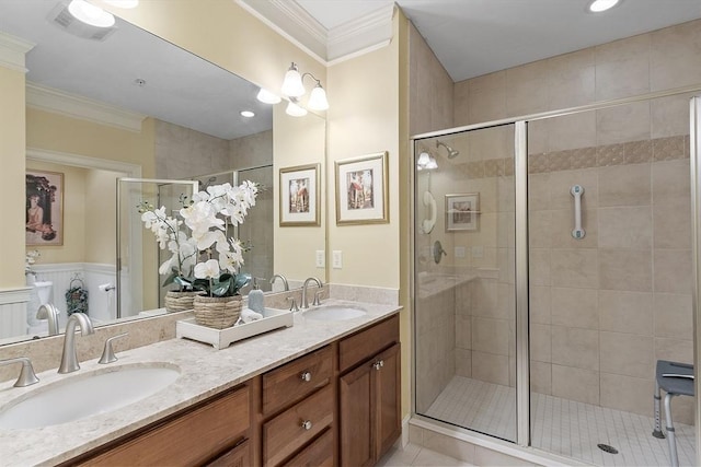 22 Hummock Way Unit 22, Hudson, MA 01749 - bathroom featuring double vanity, a stall shower, crown molding, and tile patterned floors