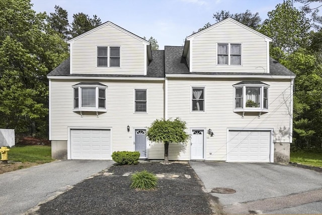 60 Mahogany Run Unit 60, Leominster, MA 01453 - view of front of property with a garage, driveway, and a shingled roof