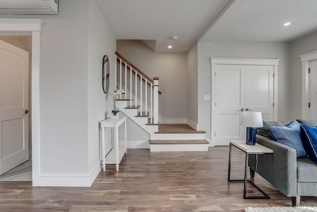 136 Flash Rd Townhome, Unit Townhome, Nahant, MA 01908 - foyer entrance featuring recessed lighting, baseboards, stairs, and wood finished floors