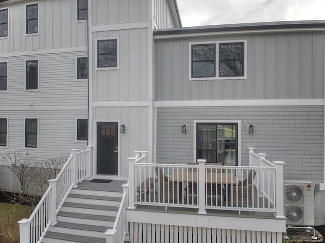 136 Flash Rd Townhome, Unit Townhome, Nahant, MA 01908 - view of property with stairway, board and batten siding, and ac unit